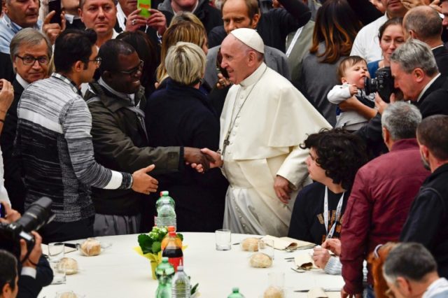 Pope Francis denounce a world in which "the wealthy few feast on what, in justice, belongs to all".