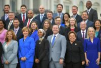 US congresswoman-elect Ilhan Omar (3rd from left in front row) is seeking a rules change beginning January 2019 to allow religious head coverings to be worn on the floor of the House of Representatives