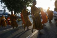 Thais seeking to earn merit and honour their ancestors often provide food to monks on their daily rounds but they can be generous to a fault