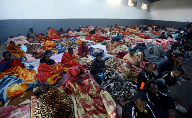 Dozens of migrants forced off boat in Libya after standoff