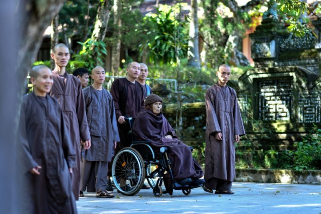 Devotees, police keep vigil as Vietnam mindfulness monk comes home