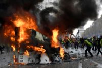 Clashes on Champs-Elysees as French protesters rage against taxes Clashes on Champs-Elysees as French protesters rage against taxes