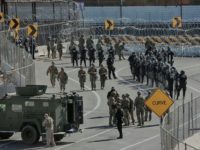 US troops and border patrol agents rushed to a border crossing between San Diego, California and Tijuana, Mexico to stop hundreds of migrants trying to clamber over border fences US troops and border patrol agents rushed to a border crossing between San Diego, California and Tijuana, Mexico to stop hundreds of migrants trying to clamber over border fences