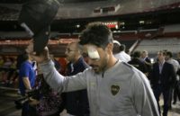 Boca Juniors captain Pablo Perez needed hospital treatment after the attack on his team's bus