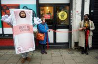 Activists perform a mock opening of a post-Brexit inspired pop-up shop in south London offering products 'which represent the miserable Brexit on offer'