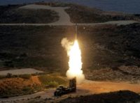 Greek troops on exercise fire an S-300 surface-to-air missile like those delivered to Syria after a September Israeli strike during which a Russian aircraft was accidentally downed