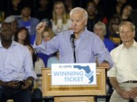 Election 2018 Florida Joe Biden, Andrew Gillum, Bill Nelson In this Oct. 22, 2018 photo former Vice President Joe Biden speaks during a campaign rally for Florida Democratic gubernatorial candidate Andrew Gillum, left, and U.S. Sen. Bill Nelson, D Fla., at the University of South Florida in Tampa, Fla. In the past, Florida's top races were tug of wars over taxes and education and insurance. This time around the governor's race is a proxy battle between President Donald Trump, who brought GOP gubernatorial nominee Ron DeSantis to prominence, and Democrats who oppose him. (AP Photo/Chris O'Meara) Joe Biden, Andrew Gillum, Bill Nelson