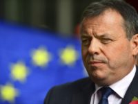 Britain Brexit Referendum Leave campaigner and businessman Arron Banks, centre, speaks to the media outside BBC Broadcasting House in London, after appearing on the Andrew Marr show, in London, Sunday, Nov. 4, 2018. Britain's National Crime Agency is investigating a main financial backer of the campaign to get Britain out of the European Union over suspected illegal funding during the country's EU membership referendum, authorities said Thursday. (Victoria Jones/PA via AP) UK says reports of imminent Brexit deal are 'speculation'