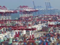 China Trade Containers are piled high at a port in Qingdao in eastern China's Shandong province Thursday, Nov. 8, 2018. Growth in Chinese exports to the United States ticked up in October as traders rushed to beat another round of tariff hikes. (Chinatopix via AP) Containers are piled high at a port in Qingdao in eastern China's Shandong province Thursday, Nov. 8, 2018. Growth in Chinese exports to the United States ticked up in October as traders rushed to beat another round of tariff hikes. (Chinatopix via AP)