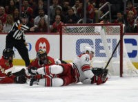 Canes hold on to beat Blackhawks 4-3, spoil Colliton's debut