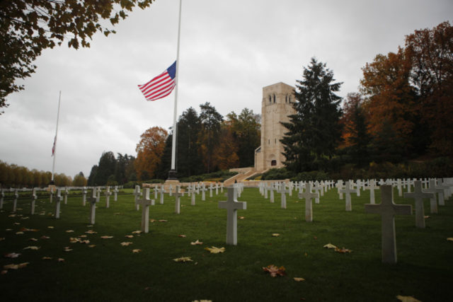 France WWI Centenial The US flag flutters at half mast prior to a ceremony at the Aisne Marne American cemetery and memorial in Belleau, eastern France, Saturday, Nov. 10, 2018. President Donald Trump cancelled his visit due to bad weather. More than 60 heads of state and government are converging on France for the commemorations that will crescendo Sunday with ceremonies at the Tomb of the Unknown Soldier in Paris on the 11th hour of the 11th day of the 11th month, exactly a century after the armistice. (AP Photo/Francois Mori) The Associated Press