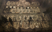 APTOPIX California Wildfires Residences were leveled by the wildfire in Paradise, Calif., on Thursday, Nov. 15, 2018. The California Department of Forestry and Fire Protection said Thursday the wildfire that destroyed the town of Paradise is now 40 percent contained, up from 30 percent Wednesday morning. (AP Photo/Noah Berger) Staggered evacuation plan questioned in fire's aftermath