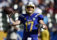 The Latest: Rivers perfect as Chargers lead Cardinals 28-10