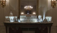 White House Christmas The gingerbread house, showcasing the full expanse of the National Mall: the Capitol, the Lincoln Memorial, the Jefferson Memorial, the Washington Monument, and, the White House is seen in the State Dining Room during the 2018 Christmas Press Preview at the White House in Washington, Monday, Nov. 26, 2018. Christmas has arrived at the White House for 2018 as first lady Melania Trump unveiled the holiday decor. She designed the decor, which features a theme of "American Treasures." (AP Photo/Carolyn Kaster) White House pastry chefs make National Mall in gingerbread