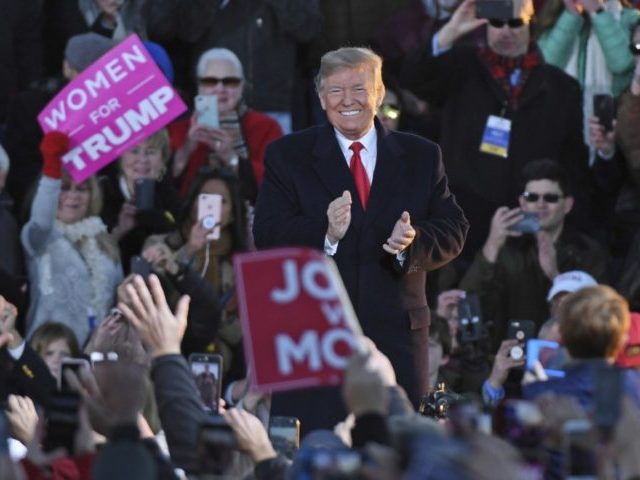 At Mississippi rally, Trump defends US response to migrants