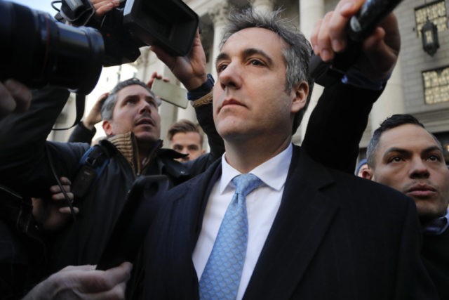 APTOPIX Trump Lawyer Investigation Michael Cohen walks out of federal court, Thursday, Nov. 29, 2018, in New York. Cohen, President Donald Trump's former lawyer, pleaded guilty to lying to Congress about work he did on an aborted project to build a Trump Tower in Russia. He told the judge he lied about the timing of the negotiations and other details to be consistent with Trump's "political message." (AP Photo/Julie Jacobson) The Associated Press