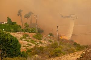 California wildfires: 44 dead as crews struggle for control