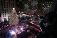 Rockefeller tree glistens with 50,000 lights, 500-pound star
