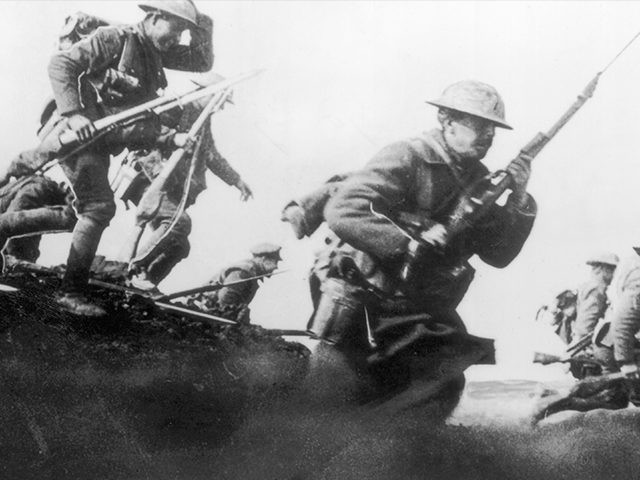 circa 1916: Canadian soldiers charging over the top. (Photo by Topical Press Agency/Getty Images)