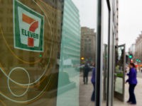 A woman walks into a 7-Eleven store in Washington, DC on January 10, 2018. US immigration agents raided nearly 100 7-Eleven convenience stores around the country, sending a warning to businesses not to hire illegal immigrants, officials said. / AFP PHOTO / Andrew CABALLERO-REYNOLDS (Photo credit should read ANDREW CABALLERO-REYNOLDS/AFP/Getty …