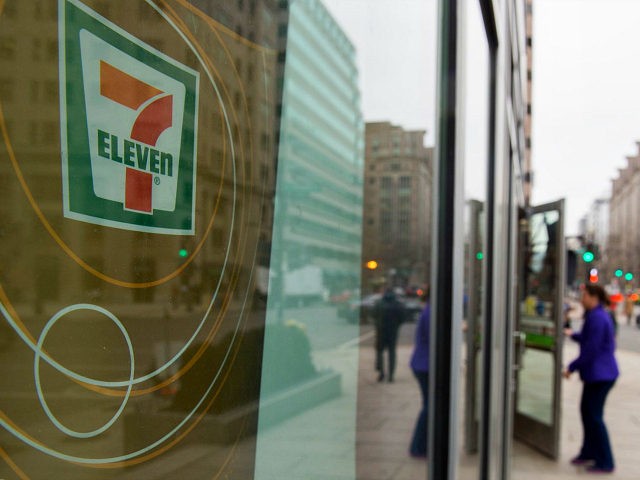 A woman walks into a 7-Eleven store in Washington, DC on January 10, 2018. US immigration agents raided nearly 100 7-Eleven convenience stores around the country, sending a warning to businesses not to hire illegal immigrants, officials said. / AFP PHOTO / Andrew CABALLERO-REYNOLDS (Photo credit should read ANDREW CABALLERO-REYNOLDS/AFP/Getty …