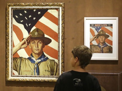 FILE - In this July 22, 2013, file photo, Andrew Garrison, 11, of Salt Lake City, looks over the Rockwell exhibition at the Mormon Church History Museum in Salt Lake City, Utah. The Mormon church's new youth program it will roll out in 2020 when it cuts all ties with …