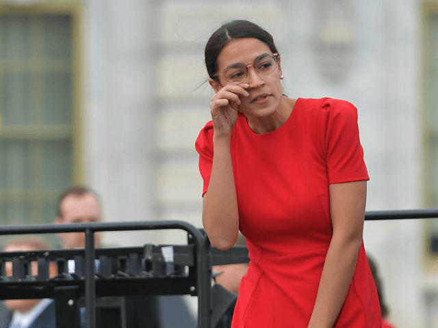 care bear commie Democratic congresswoman-elect Alexandria Ocasio-Cortez, NY, (L) arrives for the 116th Congress members-elect group photo on the East Front Plaza of the US Capitol in Washington, DC on November 14, 2018. (Photo by MANDEL NGAN / AFP) (Photo credit should read MANDEL NGAN/AFP/Getty Images)