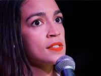 Alexandria-Ocasio-Cortez-election-night-mic-getty Alexandria Ocasio-Cortez speaks to her supporters during her election night party in the Queens Borough of New York on November 6, 2018. - 28-year-old Alexandria Ocasio-Cortez from New Yorks 14th Congressional district won Tuesdays election, defeating Republican Anthony Pappas and becomes the youngest woman elected to Congress. (Photo by Don …