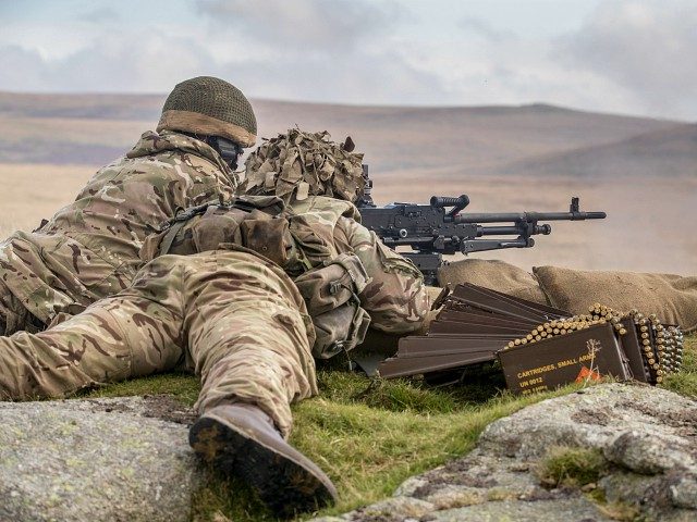 OKEHAMPTON, ENGLAND - SEPTEMBER 26: Soldiers from 6 RIFLES fire live ammunition from a General Purpose Machine Gun (GPMG) on the range at Okehampton Camp, Dartmoor, during the 6th Battalion, The Rifles' Annual Deployment Exercise near Okehampton on September 26, 2017 in Devon, England. The Reservists soldiers were joined by …