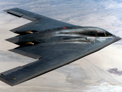 INFLIGHT - AUGUST 14: In this handout photo provided by the U.S. Air Force, the B-2 flies over Edwards Air Force Base August 14, 2003 over California. The B-2 Global Power Bomber Combined Test Force dropped two newly upgraded 5,000-pound GBU-28 bombs for the first time. (Photo by U.S. Air …