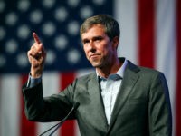 Beto-O'Rourke-pointing-up-flag-ap Beto O'Rourke speaks during the general session at the Texas Democratic Convention Friday, June 22, 2018, in Fort Worth, Texas. (AP Photo/Richard W. Rodriguez)