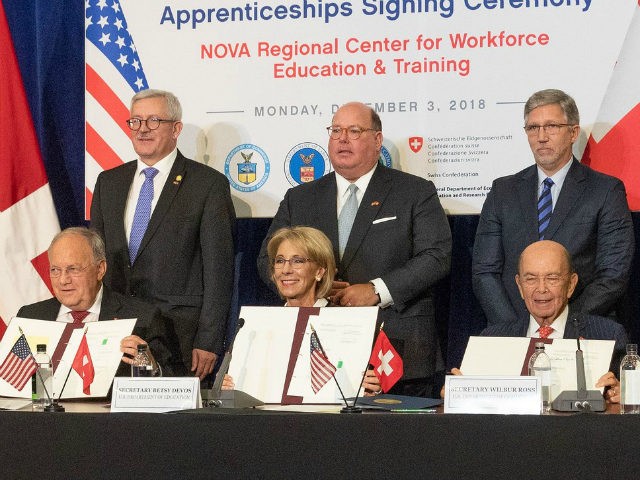 Secretary DeVos, Ivanka Trump, Secretary Acosta, Secretary Ross, and Swiss Economics Minister Johann N. Schneider-Ammann joined together to sign an MOU encouraging cooperation between the Switzerland and the U.S. in the field of apprenticeships.