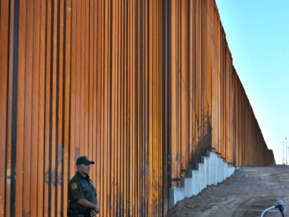 Border Patrol officers keep watch before US Department of Homeland Security Secretary Kirstjen M. Nielsen inaugurates the first completed section of President Trumps 30-foot border wall in the El Centro Sector, at the US Mexico border in Calexico, California on October 26, 2018. (Border Patrol officers keep watch before US …