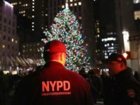 Christmas-tree-NYPD-counterterrorism-afp Counterterrorism police stand guard near the Christmas tree at Rockefeller Center in New York City in 2017 (GETTY IMAGES NORTH AMERICA/AFP/File JOHN MOORE)