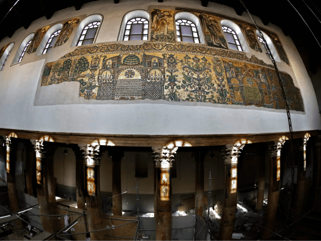 A picture taken on November 30, 2018, shows renovated mosaics and columns inside the Church of the Nativity in the occupied West Bank biblical city of Bethlehem. - The Italian government and the Palestinian Authority have been working in a joint effort to restore the Church of the Nativity since …
