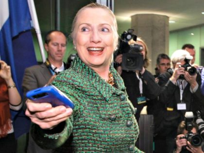 Clinton Hands over Phone