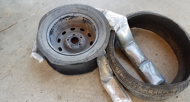 Laredo Sector Border Patrol agents find 14 bundles of cocaine in a spare tire at the I-35 checkpoint in South Texas. (Photo: U.S. Border Patrol/Laredo Sector)