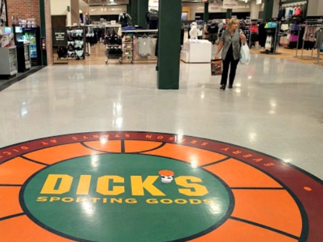 Shoppers walk inside a Dick's Sporting Goods store in Glendale, California, February 28, 2
