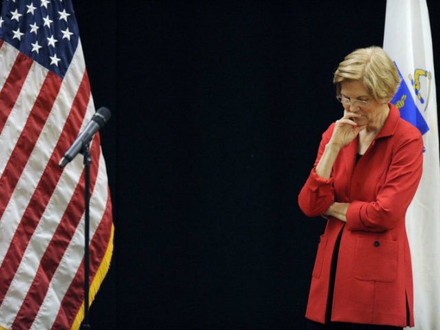 US Senator Elizabeth Warren (D-MA) listens during a town hall meeting in Roxbury, Massachusetts, October 13, 2018. (Photo by Joseph PREZIOSO / AFP) (Photo credit should read JOSEPH PREZIOSO/AFP/Getty Images)