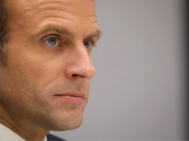 France's President Emmanuel Macron gestures during a bilateral meeting with India's Prime