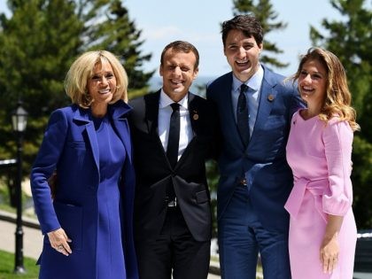 QUEBEC CITY, QC - JUNE 08: French President Emmanuel Macron (C-L) and wife Brigitte Macron (L) pose with Prime Minister of Canada Justin Trudeau and wife Sophie Gregoire during the G7 official welcome at Le Manoir Richelieu on day one of the G7 meeting on June 8, 2018 in Quebec …