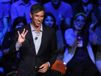 HOUSTON, TEXAS - OCTOBER 30: U.S. Senate candidate Rep. Beto O'Rourke (D-TX) flashes the U