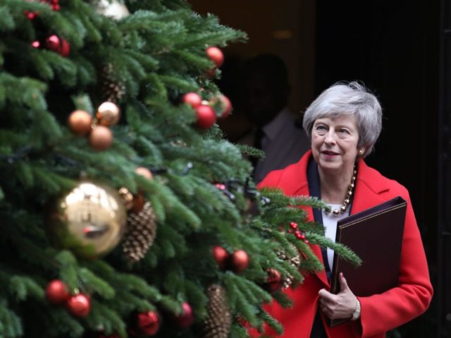 Britain's Prime Minister Theresa May leaves 10 Downing Street in London on December 4, 2018. - British MPs on Tuesday begin debating a highly contentious Brexit deal amid a row over the government's refusal to publish its legal advice, as a top EU court lawyer said Britain can unilaterally change …