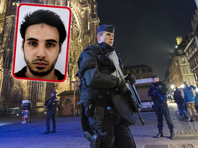 STRASBOURG, FRANCE - DECEMBER 12: Police officers patrol in front of the cathedral near th