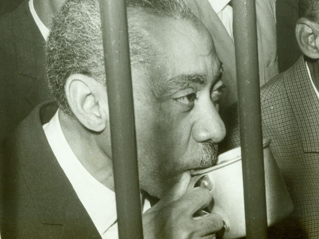 Sayyid Qutb drinks in 1966 a cup of water behind bars in Cairo. Sayyid Qutb (born 09 Octob