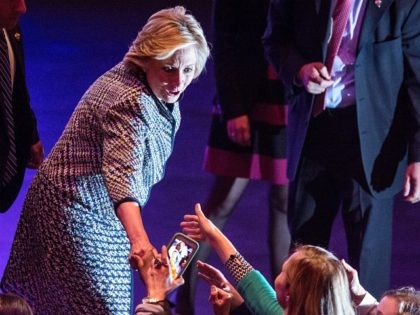 NEW YORK, NY - APRIL 23: Democratic presidential hopeful and former Secretary of State Hillary Clinton shakes hands with supporters after addressing the Women in the World Conference on April 23, 2015 in New York City. Clinton is in New York City after visiting Iowa and New Hampshire. (Photo by …