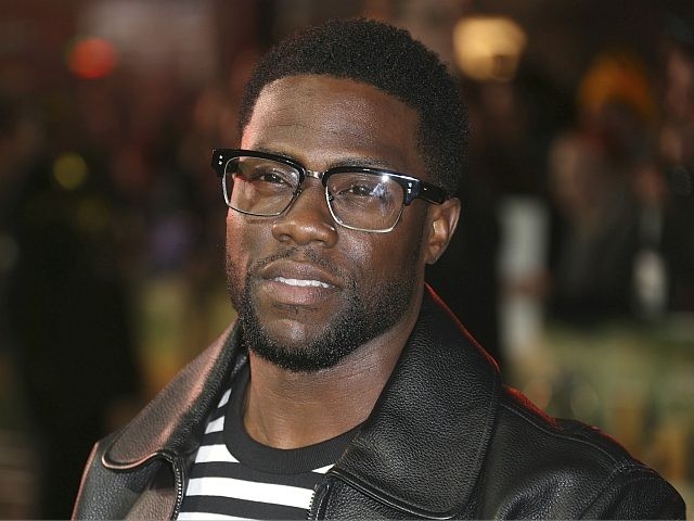 Actor Kevin Hart poses for photographers upon arrival at premiere of the film 'Jumanj