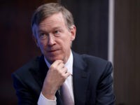 John-Hickenlooper-hand-chin-getty Colorado Gov. John Hickenlooper participates in a discussion as part of the Brookings Institution's Middle Class Initiative October 10, 2018 in Washington, DC. Hickenlooper, a Democrat, and Ohio Gov. John Kasich, a Republican, participated in the discussion and found common ground on issues related to the economy, trade, education and …