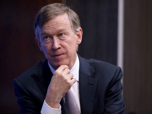 Colorado Gov. John Hickenlooper participates in a discussion as part of the Brookings Institution's Middle Class Initiative October 10, 2018 in Washington, DC. Hickenlooper, a Democrat, and Ohio Gov. John Kasich, a Republican, participated in the discussion and found common ground on issues related to the economy, trade, education and …