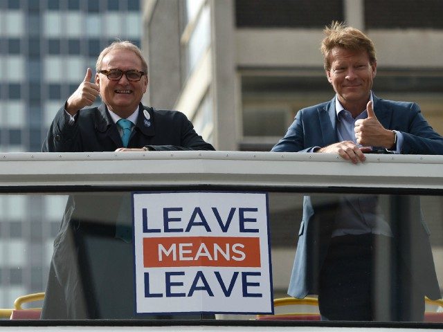 Leave Means Leave campaign co-chairs John Longworth (L) and Richard Tice gesture aboard Th